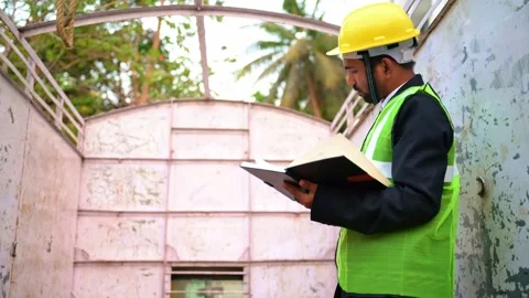 Construction Worker Inspecting material in tempo Stock Footage 281335780