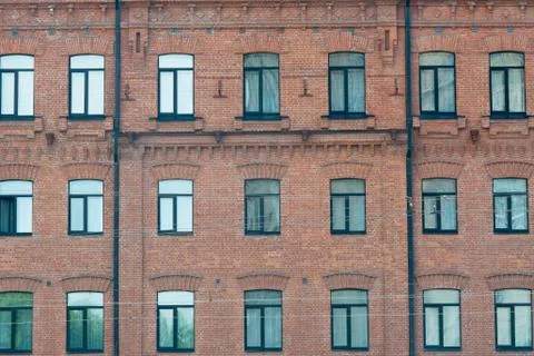 Construction Worker Installing New Windows In House Stock Photos