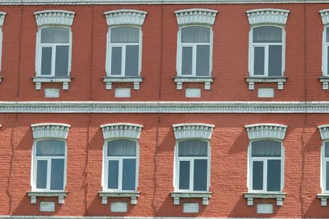 Construction Worker Installing New Windows In House Stock Photos