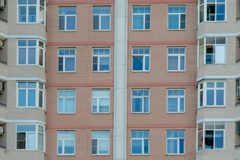 Construction Worker Installing New Windows In House Stock Photos