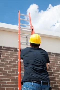 Construction Worker on Ladder Stock Photos