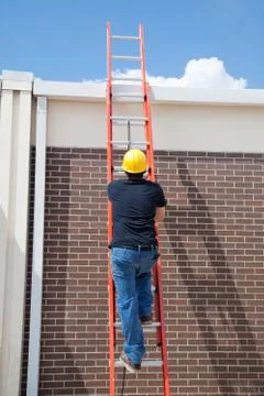 Construction Worker on Ladder Stock Photos