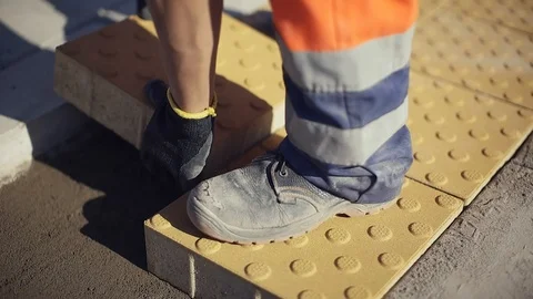 Construction Worker Laying Concrete Pavement On The Street Stock Footage 123228783