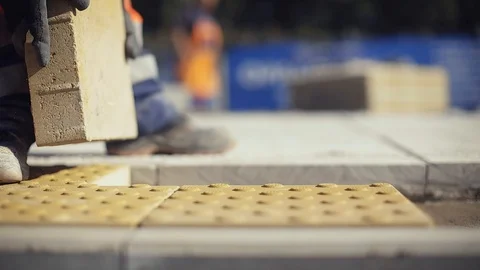 Construction Worker Laying Concrete Pavement On The Street Stock Footage 123961101