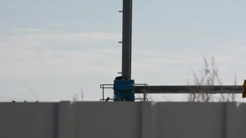 Construction worker on lift platform Stock Footage 169742180