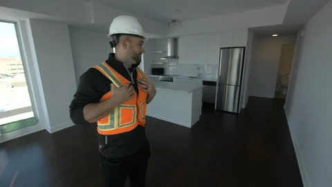 Construction worker likes his new home build Stock Footage 100032412