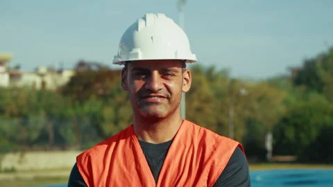 Construction worker looking and smiling at the camera Stock Footage 331514283