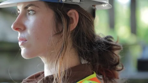 Construction worker looks at the camera Stock Footage 91014256