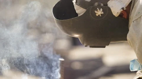 Construction worker makes welding of reinforcement Stock Footage 160470462