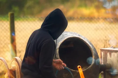 A construction worker making concrete Foto stock