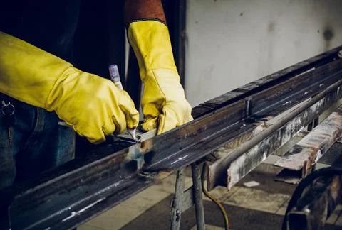 Construction worker man hand measuring with marker Stock Photos