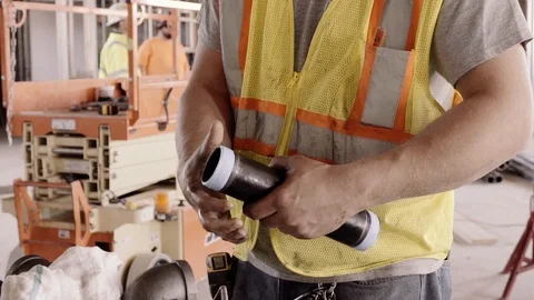 A Construction Worker Measures A Pipe And Marks It 스톡 동영상 87483843