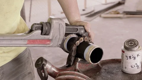 A Construction Worker Measures A Pipe And Marks It 스톡 동영상 87484082