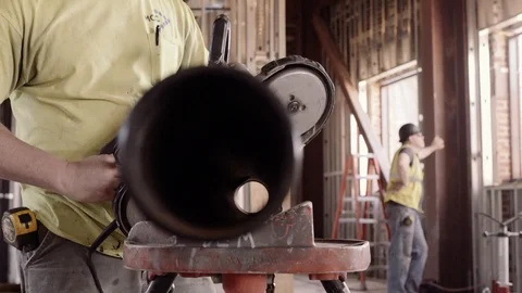 A Construction Worker Measures A Pipe And Marks It 스톡 동영상 87484203