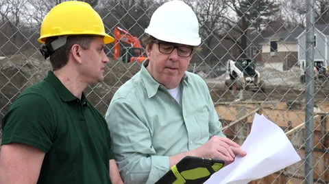 Construction worker meeting with Architect on site Stock Footage 49087021