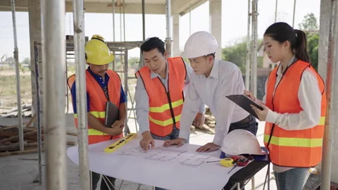 Construction worker meeting in a house construction site. Stock Footage 182422018