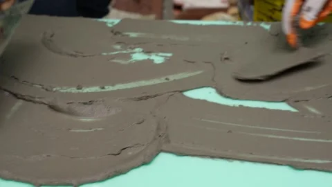 Construction Worker Mortar Smoothing Closeup Video stock 310209730