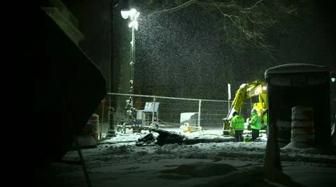 Construction worker at night in the snow 2 Stock Footage 17048382