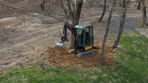 Construction Worker Operating an Excavator Stock Footage 106260130