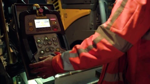Construction worker operating machine at construction site 스톡 동영상 81618203