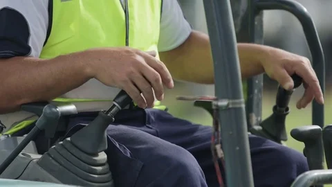 Construction worker operating machinery Stock Footage 76735601