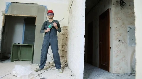 Construction worker with perforator Stock Footage 106261125