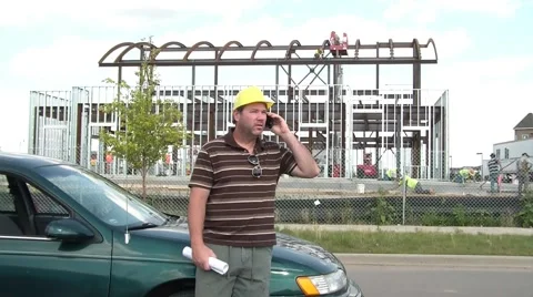 Construction Worker on Phone with Blueprints 스톡 동영상 65745748