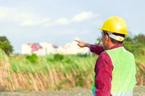 Construction Worker Planning Contractor Checking  at site gas, oil, energy an Stock Photos