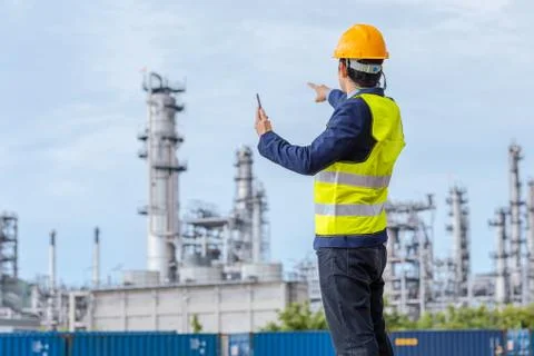 Construction Worker Planning Contractor Checking  at site gas, oil, energy an Stock Photos