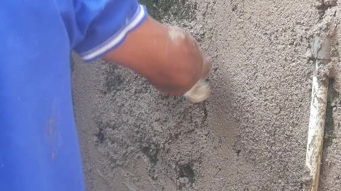 A construction worker is plastering a wall Stock Footage 333343648