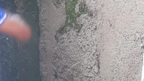 A construction worker is plastering a wall Stock Footage 333343664