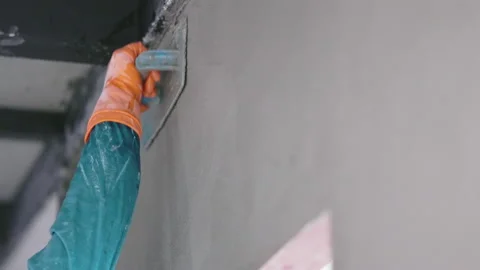Construction worker plastering wall surface. Stock Footage 196974588
