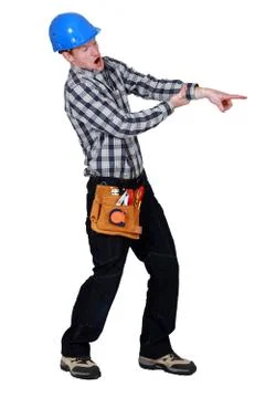Construction worker pointing in shock Stock Photos