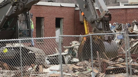 Construction worker prepares bulldozer cab before demolition Stock Footage 49935959