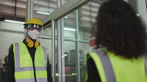 Construction worker put on face mask and Face Shield used body temperature Stock Footage 146823532