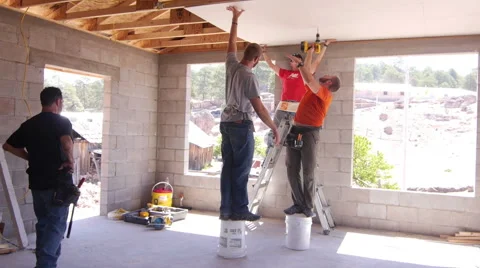 Construction worker putting up drywall Stock-Footage 40377461