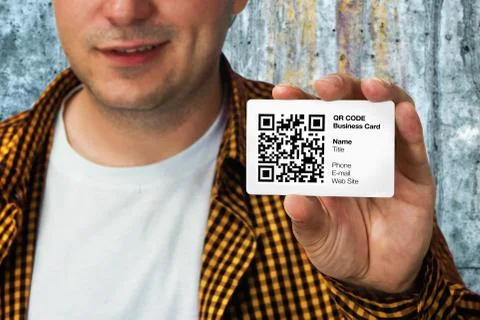 Construction worker with qr code business card Foto stock