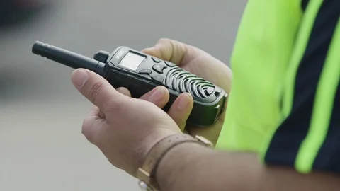 Construction worker on radio Stock Footage 76735442