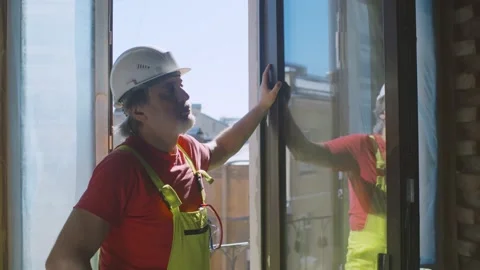Construction worker relaxing enjoying fresh air during work Stock Footage 133635996