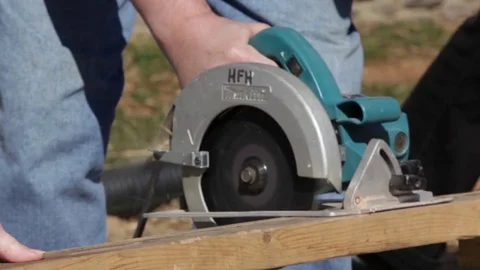 Construction Worker Sawing Lumber Stock Footage 81751766