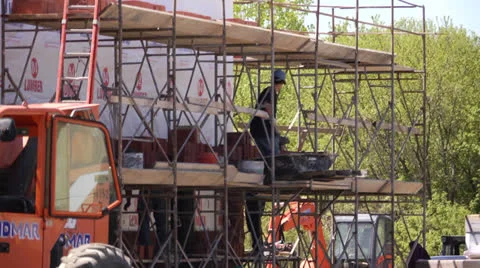 Construction worker on scaffolding Stock Footage 23115197