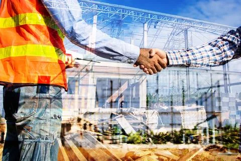 Construction worker shake hands and negotiation Stock Photos