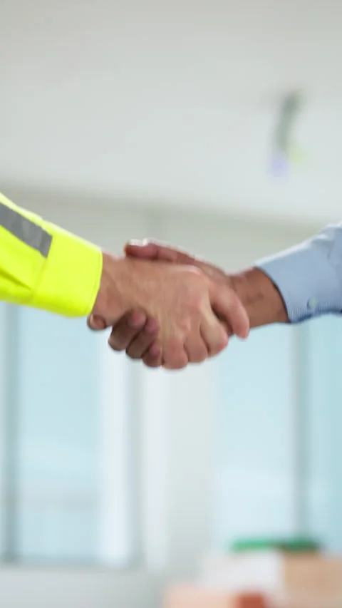 Construction Worker Shaking Hands With African American Client Stock Footage 330584227