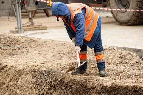 Construction worker with a shovel Stock Photos