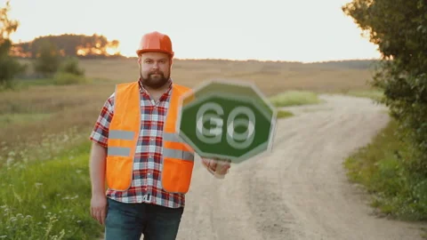 Construction worker showing a go sign. Concept of action Stock Footage 90884643