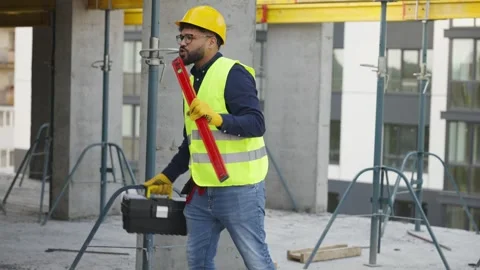 Construction worker singing and dancing on site Video stock 343449832