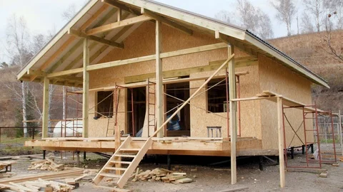 Construction worker on site carry pipe. Builder puts inside the water pipe under 스톡 동영상 96987346