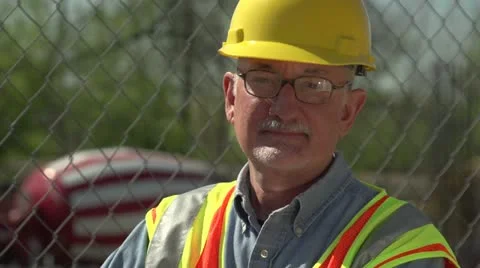 Construction worker on site, looking at camera, close up Stock Footage 10902625