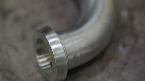 Construction worker at the site welding metal pipes with special blue helmet Stock Footage 142889014