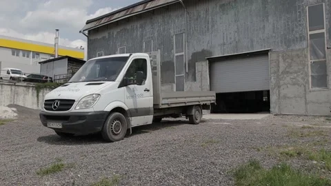 Construction worker at the site welding metal pipes with special blue helmet Stock Footage 142901941